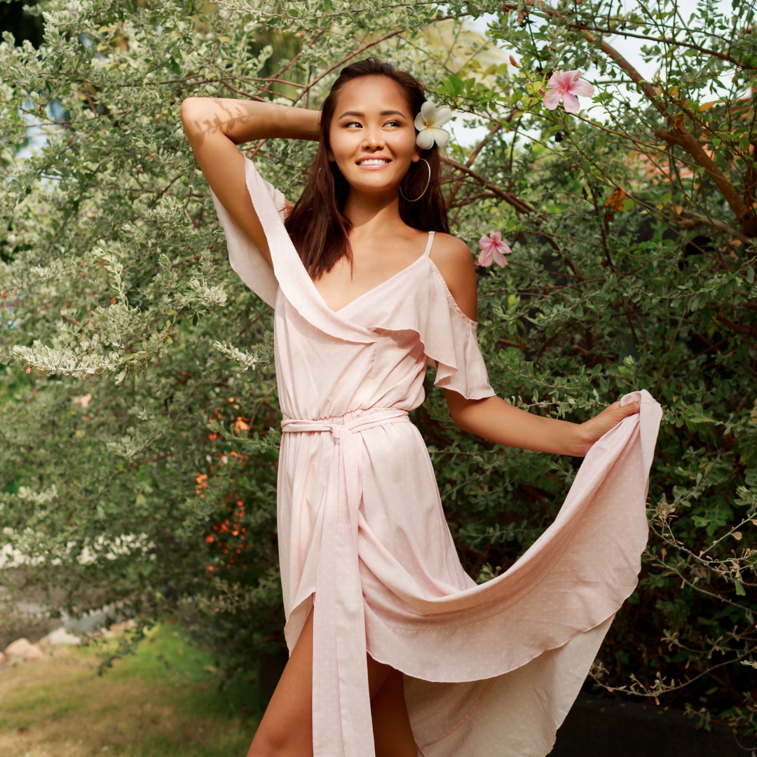 Woman in elegant dress at outdoor garden wedding — Emmy & Elliewedding guest dresses