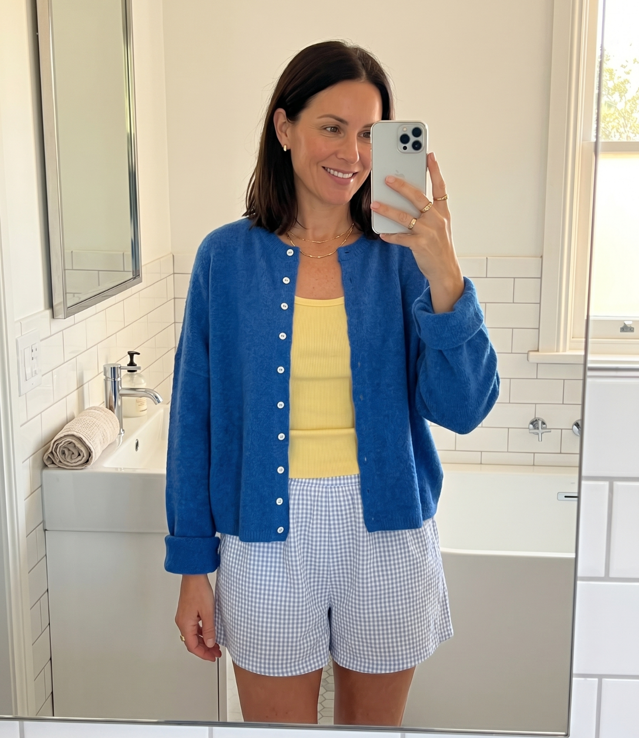 Woman in bathroom mirror selfie wearing cardigan — Emmy & Ellie verified buyer review